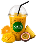 Orange smoothie in a clear cup with a black straw, surrounded by an orange, mango, passionfruit and pineapple. KAIA brand on the cup